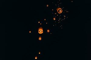 Floating lanterns at Yi Peng Festival in Chiang Mai photo