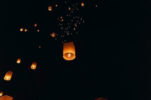 Floating lanterns at Yi Peng Festival in Chiang Mai photo