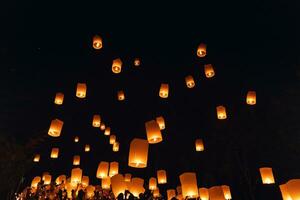 Floating lanterns at Yi Peng Festival in Chiang Mai photo