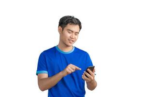 Happy man cheering excitedly in celebration after good news. Excited guy winner holding cellphone winning game online or investing trading, using mobile app celebrates victory success photo