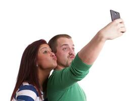 pareja joven tomando selfie foto