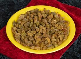 Healthy Sweet Golden Raisins or Dried Grapes photo