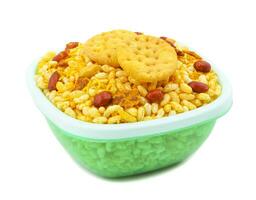 Indian Street Spicy Food Bhel puri is a savoury snack on white background photo