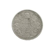 Indian old Coin or Indian Currency on White Background photo