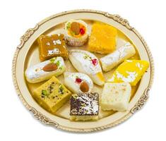 Indian Delicious Mix Sweet Food or Mix Mithai on White Background photo