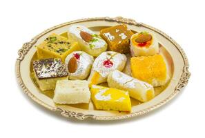 Indian Delicious Mix Sweet Food or Mix Mithai on White Background photo