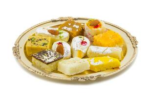 Indian Delicious Mix Sweet Food or Mix Mithai on White Background photo