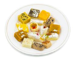 Indian Delicious Mix Sweet Food or Mix Mithai on White Background photo