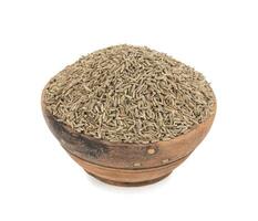 Pile of Dried Cumin Seeds on white Background photo