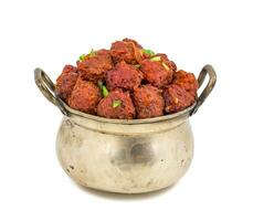 Indian Cuisine Vegetable Manchurian on White Background photo