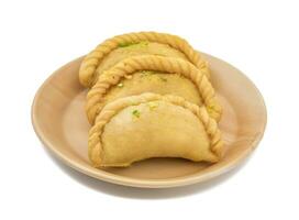 Gujiya or Gujia is a indian sweet food photo