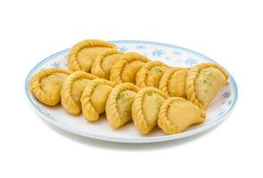 Gujiya or Gujia is a indian sweet food photo