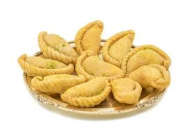 Gujiya or Gujia is a indian sweet food photo