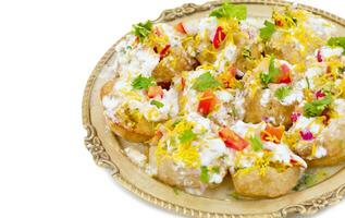 Indian Sweet And Spicy Chaat item Dahi Puri on White Background photo