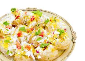 Indian Sweet And Spicy Chaat item Dahi Puri on White Background photo