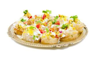 Indian Sweet And Spicy Chaat item Dahi Puri on White Background photo