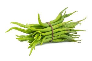 Heap of Green Chili or Mirchi on White Background photo