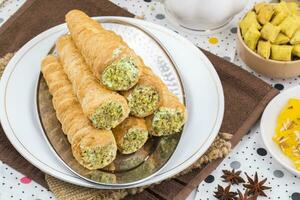 Indian Sweet Bakery Food Puff Roll with Cream photo