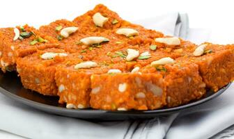 Indian Sweet Food Akhrot Halwa on White Background photo