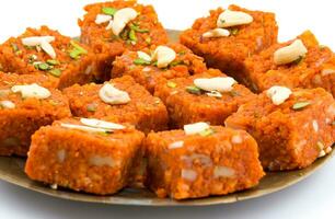 Indian Sweet Food Akhrot Halwa on White Background photo