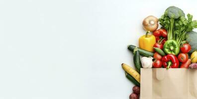 AI generated Healthy food in paper bag vegetables and fruits on white background. AI Generated photo