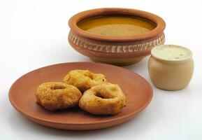 South Indian Popular Breakfast Vada Served With Sambar And Coconut Chutney photo