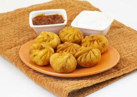 Fried Momos is a Traditional Dumpling Food From Nepal photo