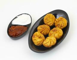 Fried Momos is a Traditional Dumpling Food From Nepal photo