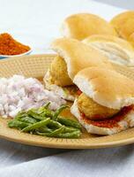 Indian Famous Street Food Vada Pav is a Vegetarian Fast Food Dish From Maharashtra photo