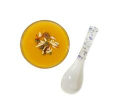 Fresh mango fruit juice on white background photo