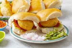 Indian Famous Street Food Vada Pav is a Vegetarian Fast Food Dish From Maharashtra photo