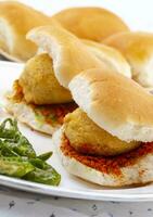 Indian Famous Street Food Vada Pav is a Vegetarian Fast Food Dish From Maharashtra photo