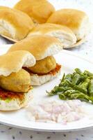 Indian Famous Street Food Vada Pav is a Vegetarian Fast Food Dish From Maharashtra photo