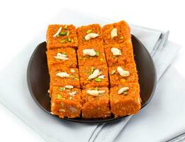 Indian Sweet Food Akhrot Halwa on White Background photo