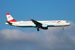 Austrian Airlines Airbus A321 OE-LBF passenger plane arrival and landing at Vienna Airport photo