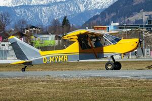 Commercial plane at airport and airfield. Small and sport aircraft. General aviation industry. Vip transport. Civil utility transportation. Fly and flying. photo