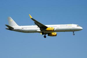 Vueling Airlines Airbus A321 EC-MQB passenger plane arrival and landing at Vienna Airport photo