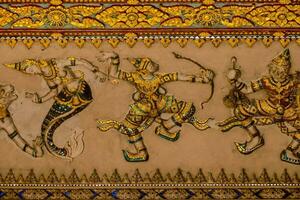 a carving depicting the dance of the gods in an ornate building photo