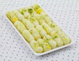 Indian Traditional Sweet Food Long Rasgulla photo