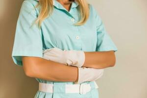 Image of medical nurse  with arms crossed. photo