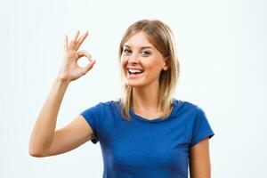 Woman showing ok sign photo