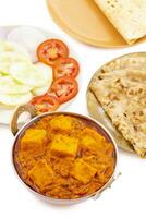 Indian Delicious Spicy Vegetarian Cuisine Paneer Toofani Served with Tandoori Roti on White Background photo