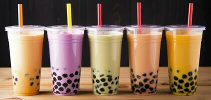 AI generated Plastic cups of different tasty bubble tea on wooden background. Generative AI photo