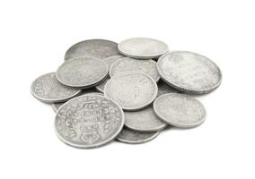 Group of Indian old Coins on White Background photo