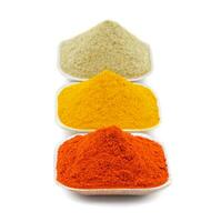 Indian Colorful Spices Also Know as Red Chilli Powder, Turmeric Powder, Coriander Powder photo