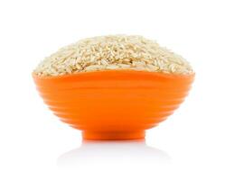 Healthy Fresh Brown Rice on White Background photo