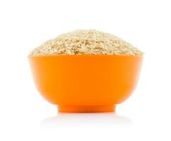 Healthy Fresh Brown Rice on White Background photo