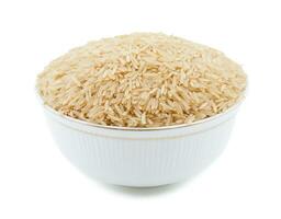 Healthy Fresh Brown Rice on White Background photo