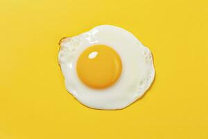 AI generated Fried egg on a yellow background. AI Generated photo