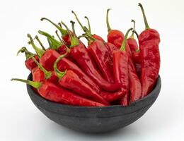 Group of Fresh Red Chili Pepper Also Called Lal Mirch on White Background photo